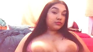 Latina Playing With Her Titties