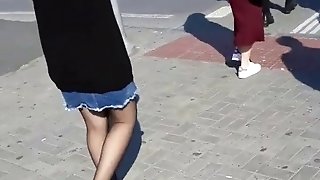 Mini Skirt And Black Panyhose Legs